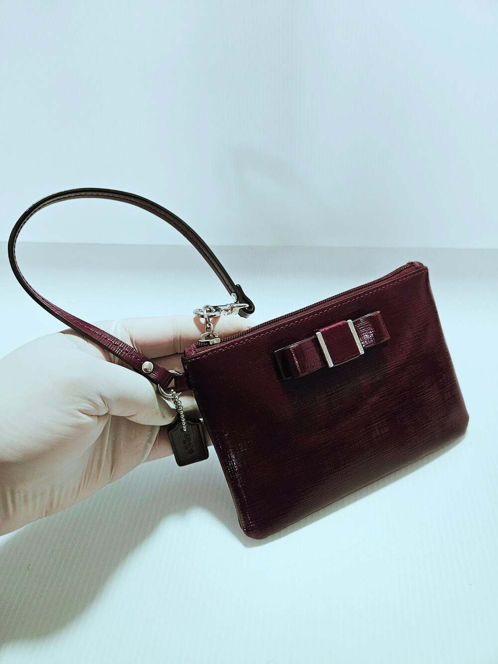 Coach Burgundy Crossgrain Leather Bow Wristlet EUC - Picture 13 of 16